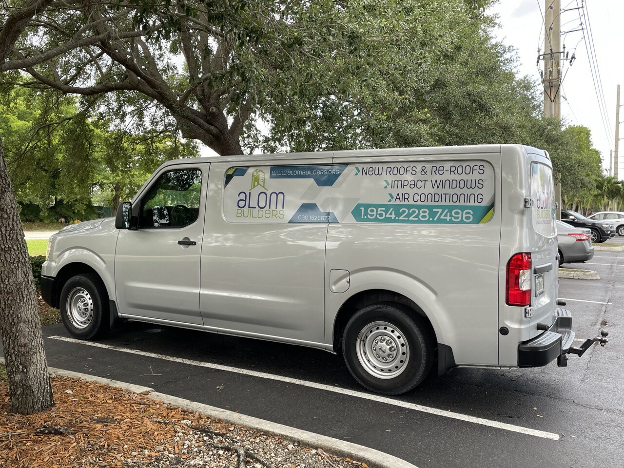 Alom Builders Roofing Company Vehicle